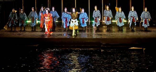 Kabuki actors Nakamura Yonekichi, Ichikawa Somegoro and support characters take their bows after performing in Tsukami or Fight with a Carp about the Fountains of Bellagio on Saturday, August 15, 2015.