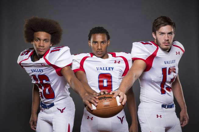 Valley High football players Daniel Deckard, Jaesion Flores, and Seth Miranda before the 2015 Season.