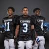 Canyon Springs football players Tyson Odum, Tre'von Dean, and Marcell Selmon before the 2015 Season.