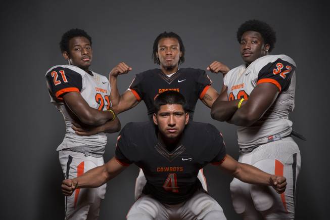 Chaparral football players Casey Acosta, Richard Nelson, Antwain Allen, and Richard Hernandez (front) before the 2015 Season.