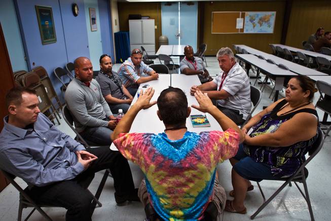 A volunteer retells his crisis story during a Crisis Intervention Team (CIT) training session within the Southern Nevada Adult Mental Health Services campus on Wednesday, August 12, 2015.