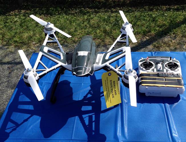 This photo shows a Yuneec Typhoon drone and controller Monday, Aug. 24, 2015, in Jessup, Md. Maryland State Police and prison officials say two men planned to use the drone to smuggle drugs, tobacco and pornography videos into the maximum-security Western Correctional Institution near Cumberland, Md. 