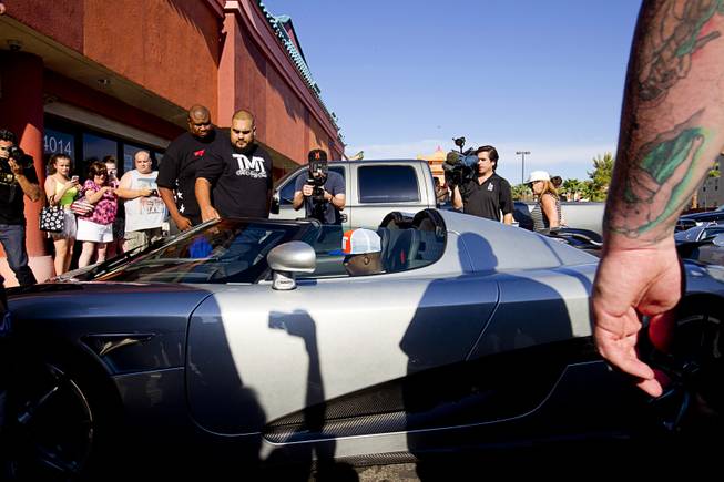 Floyd Mayweather Jr. arrives in his new $4.8 million Koenigsegg CCXR Trevita for a workout at the Mayweather Boxing Club Wednesday, Aug. 26, 2015. Mayweather will defend his WBC and WBA welterweight titles against Andre Berto on Sept. 12 at the MGM Grand Garden Arena.