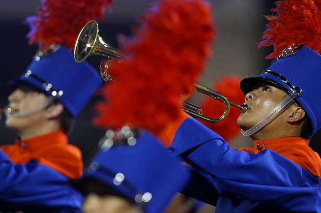 A trumpet player plays with the Bishop Gorman High School Marching Band at halftime during a game against Chandler (Ariz.) High School at Bishop Gorman Saturday, Aug. 29, 2015. Bishop Gorman beat Chandler 35-14.