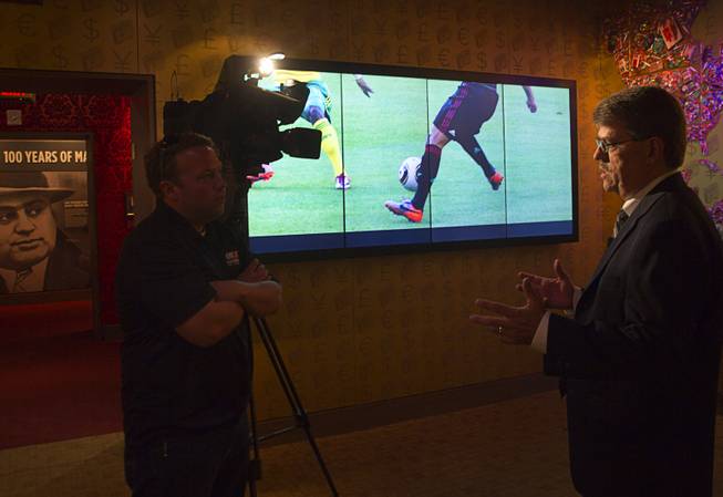 Geoff Schumacher, director of content, responds to a question during an interview as the Mob Museum, the National Museum of Organized Crime and Law Enforcement, unveils "The Beautiful Game Turns Ugly," a new exhibit on the FIFA scandal at the museum in downtown Las Vegas Tuesday, Sept. 1, 2015.