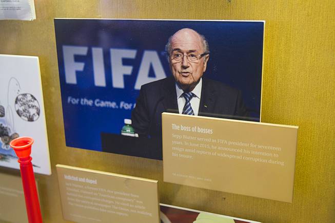 A photo of FIFA President Sepp Blatter is displayed in "The Beautiful Game Turns Ugly," a new exhibit on the FIFA scandal at the Mob Museum, the National Museum of Organized Crime and Law Enforcement, in downtown Las Vegas Tuesday, Sept. 1, 2015.
