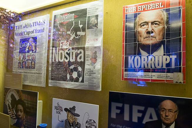 Newspapers and magazines are displayed in "The Beautiful Game Turns Ugly," a new exhibit on the FIFA scandal at the Mob Museum, the National Museum of Organized Crime and Law Enforcement, in downtown Las Vegas Tuesday, Sept. 1, 2015.