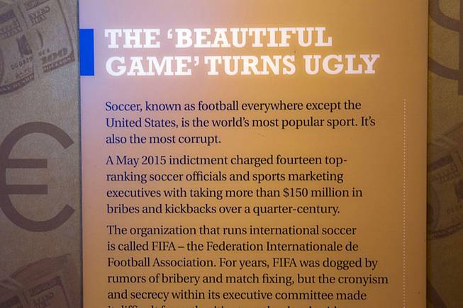 A sign gives context to "The Beautiful Game Turns Ugly," a new exhibit on the FIFA scandal at the Mob Museum, the National Museum of Organized Crime and Law Enforcement, in downtown Las Vegas Tuesday, Sept. 1, 2015.