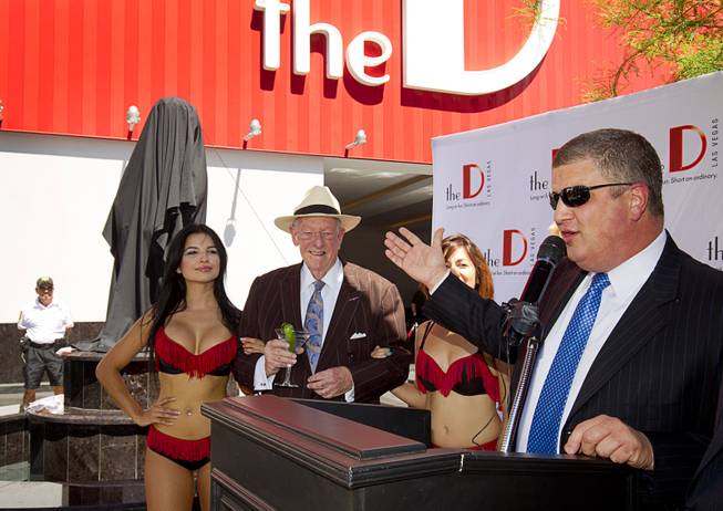 The D Las Vegas owner Derek Stevens gestures toward Manneken Pis Las Vegas at an unveiling ceremony at The D Las Vegas on Tuesday, Sept. 1, 2015, in downtown Las Vegas.