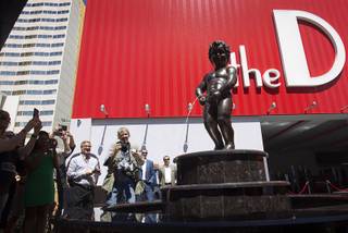 The Manneken Pis Las Vegas statue is shown after an unveiling ceremony at The D Las Vegas on Tuesday, Sept. 1, 2015, in downtown Las Vegas.