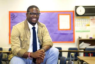 Eric Smith, a second-year Teach for America corps member, poses in his classroom at O'Callaghan Middle School  Wednesday, Sept. 2, 2015.