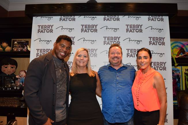 Herschel Walker, Angie Fiore, Terry Fator and Walker’s fiancee Julie on Wednesday, Sept. 2, 2015, at the Mirage.