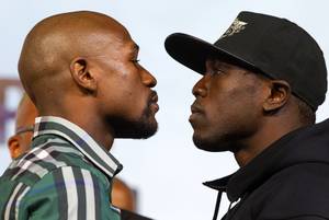 Undefeated WBC/WBA welterweight champion Floyd Mayweather Jr., left, faces off with challenger Andre Berto during a news conference at the MGM Grand Sept. 9, 2015. Mayweather will defend his titles against Berto at the MGM Grand Garden Arena Saturday in what he says will be his final fight.