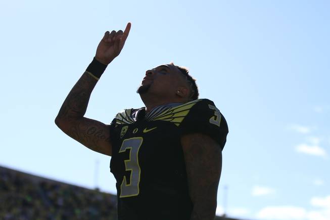 Oregon quarterback Vernon Adams Jr. (3) points to the sky before an NCAA college football game against Eastern Washington Saturday, Sept. 5, 2015, in Eugene, Ore.
