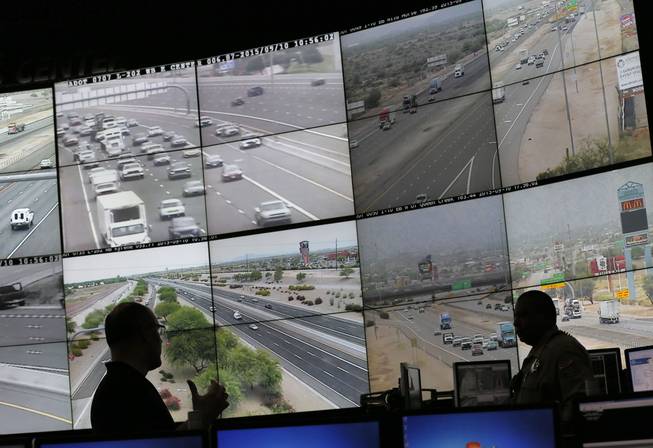 Arizona Department of Transportation Live Traffic Operations operators monitor over 200 freeway camera's throughout the Phoenix Metro area, Thursday, Sept. 10, 2015 in Phoenix.