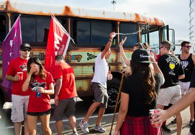 UNLV fraternity and sorority members begin to get rowdy in the parking lot as they party before the game versus UCLA at Sam Boyd Stadium on Saturday, September 12, 2015.