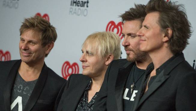 Duran Duran arrives at the 2015 iHeartRadio Music Festival red carpet Friday, Sept. 18, 2015, at MGM Grand Garden Arena.