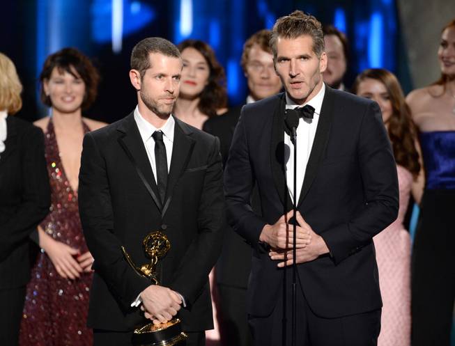 D.B. Weiss and David Benioff accept the award for outstanding drama series for “Game of Thrones” at the 67th Primetime Emmy Awards on Sunday, Sept. 20, 2015, at Microsoft Theater in Los Angeles.
