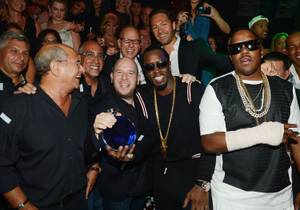 Lou Abin, Marc Packer, Rich Wolf, Noah Tepperberg, Puff Daddy and Jason Strauss celebrate the 10th anniversary of Tao on Saturday, Sept. 19, 2015, at the Venetian.