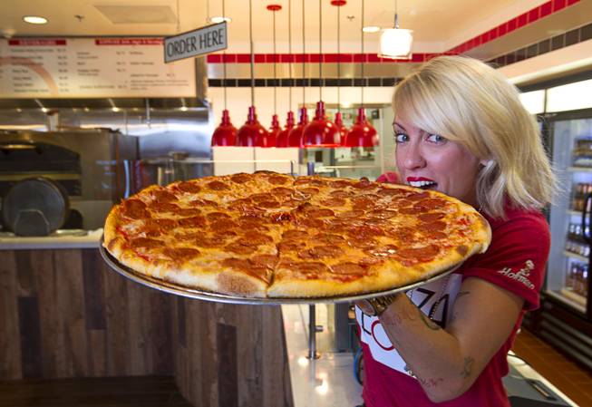 Pizza Forte co-owner Nikki Ferraro poses in the pizza shop at the Hard Rock Thursday, Sept. 24, 2015.