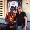 Del Sol running back Taariq Flowers is the Wingstop Player of the Week. He's pictured with Deb Grant, the Las Vegas Area District Manager for Wingstop.  