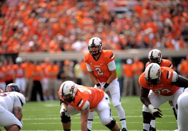 Oklahoma State quarterback (2) Mason Rudolph is pictured during an NCAA college football game between UTSA and Oklahoma St in Stillwater, Okla., Saturday, Sept. 19, 2015.