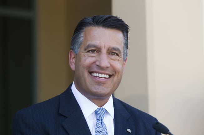 Governor Brian Sandoval speaks at the ribbon cutting ceremony for Barrick Golds global IT operations center in Henderson on September 25, 2015....