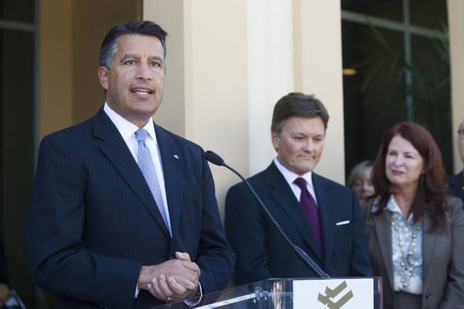 Governor Brian Sandoval speaks at the ribbon cutting ceremony for Barrick Golds global IT operations center in Henderson on September 25, 2015....