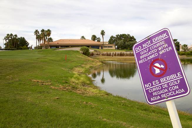A sign warns not to drink the irrigation water at the Palm Valley Golf Course in Summerlin Monday Sept. 28, 2015. The course is irrigated with reclaimed water and is converting some the rough to desert landscaping.