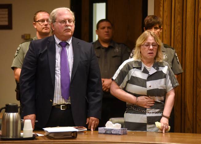 Joyce Mitchell appears in Clinton County Court with her lawyer, Steven Johnston, to be sentenced Monday, Sept. 28, 2015, in Plattsburgh, N.Y. Mitchell, who helped two convicted murderers escape from a maximum-security lockup by providing them with tools, was sentenced Monday to as many as seven years behind bars.