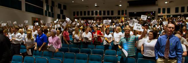 Parents, students and community members for "Opt In" stand in support during a debate on sex ed with before the CCSD Board of Trustees at the Las Vegas Academy on Tuesday, September 29, 2015.