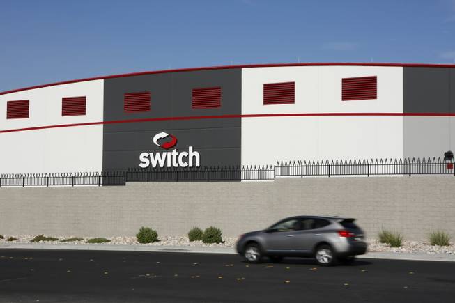 In this Wednesday, Sept. 9, 2015, photo, a car drives by a Switch data center in Las Vegas.