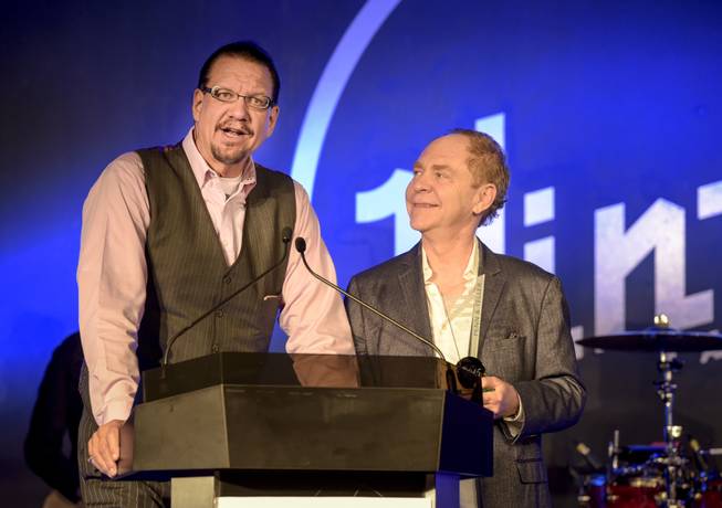 Casino Entertainer of the Year award winners Penn Jillette and Teller accept their award during the 2015 Casino Entertainment Awards presented by Global Gaming Expo at Vinyl on Wednesday, Sept. 30, 2015, in the Hard Rock Hotel.