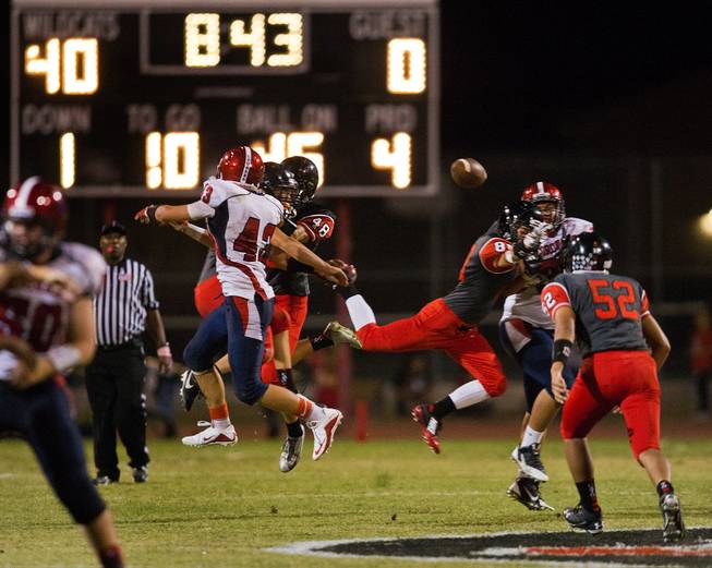 Another Coronado High School pass is disrupted by Las Vegas defenders as their lopsided football game nears an end on Friday, December 02, 2015.