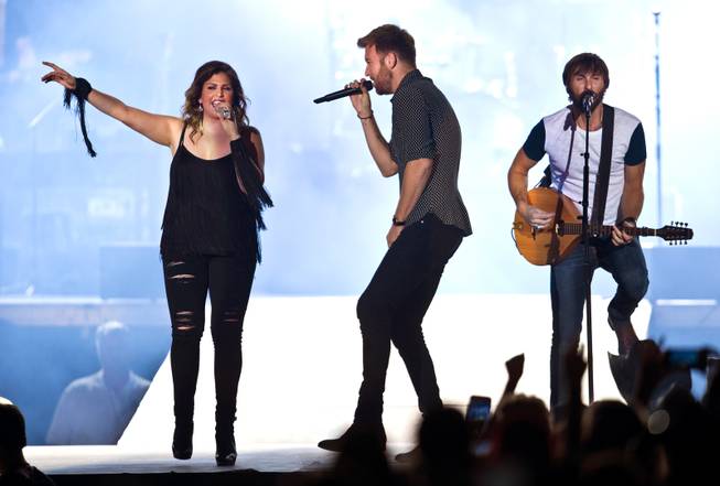Hillary Scott, Charles Kelley and Dave Haywood of Lady Antebellum perform for the crowd on the Main Stage during the Route 91 Harvest Country Music Fest on Saturday, Oct. 3, 2015, at Las Vegas Village.