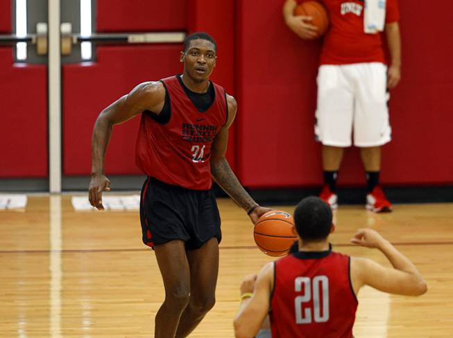 Chris Obekpa, left, (34) runs drills with teammates during the Rebels' first basketball practice of the season at the Mendenhall Center on UNLV campus Monday, Oct. 5, 2015.