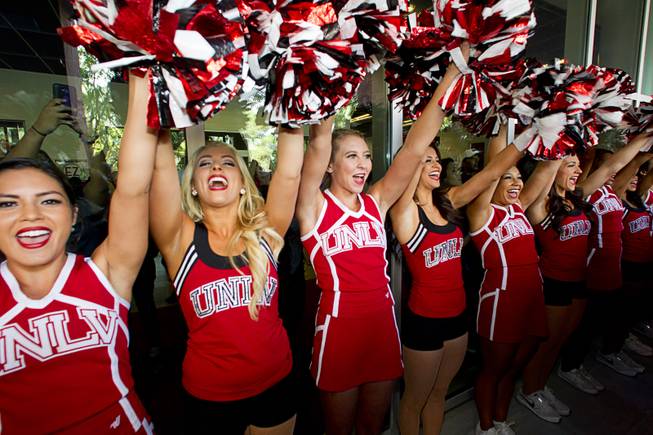 UNLV cheerleaders show their spirit during a cannon-painting ceremony Monday, Oct. 5, 2015, at UNLV. The Rebels recovered the Fremont Cannon after defeating the Wolfpack 23-17 on Saturday in Reno.