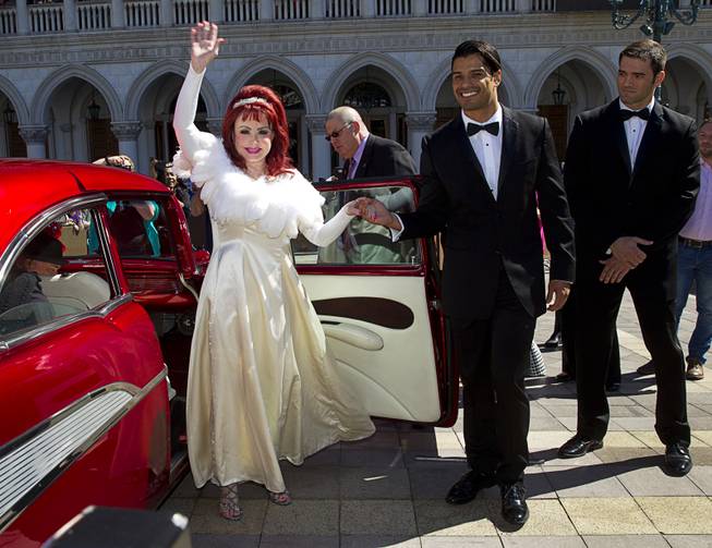 Naomi Judd waves as she arrives Tuesday, Oct. 6, 2015, at the Venetian. Reuniting for the first time in nearly five years, the mother-daughter duo The Judds will perform at the Venetian Theater from Oct. 7-24, 2015.