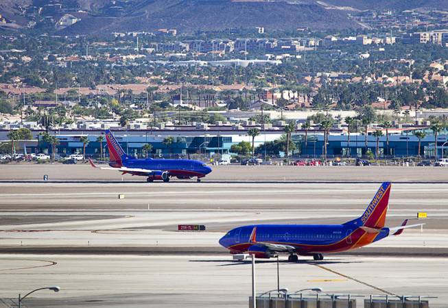 Southwest Airlines passenger jets are shown at McCarran International Airport Sunday, Oct. 11, 2015.