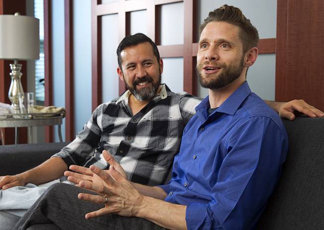 Danny Pintauro, right, responds to a question during an interview at the Newport Lofts Monday, Oct. 12, 2015. His husband Wil Tabares looks on at left. Pintauro, best known for his work in the 1980's television sitcom "Who's the Boss?," recently came out as HIV positive on an episode of Oprah.