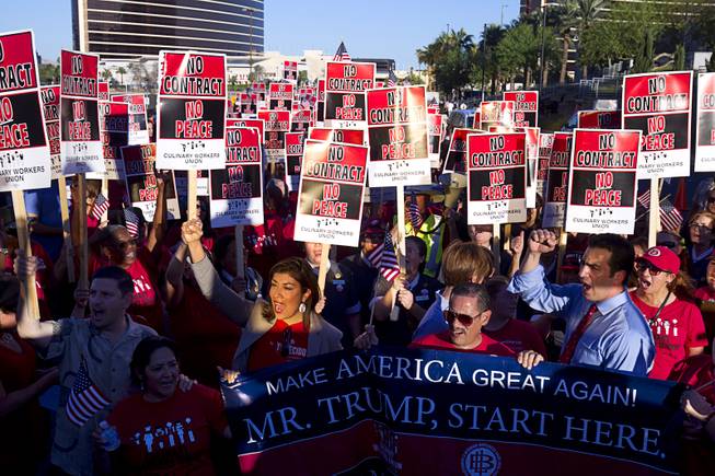 Culinary union members and supporters protest during a Culinary Workers Union, Local 226, demonstration by the Trump International Hotel Monday, Oct. 12, 2015.