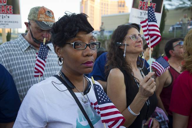 Linda Daniel, a member of the American Postal Workers Union, local 130, attends a Culinary Workers Union, Local 226, demonstration by the Trump International Hotel Monday, Oct. 12, 2015.