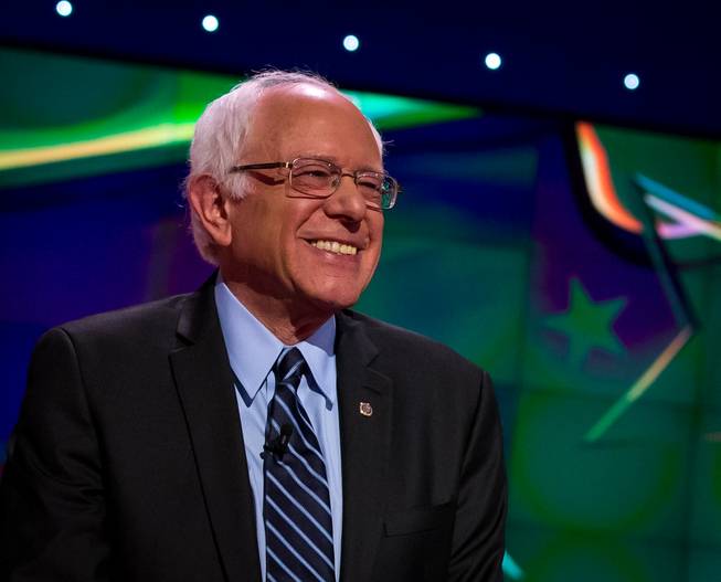 Democratic presidential candidate Sen. Bernie Sanders of Vermont takes the stage Tuesday, Oct. 13, 2015, during the CNN Democratic presidential debate at Wynn Las Vegas.