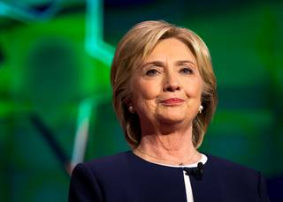 Democratic presidential candidate former Secretary of State Hillary Rodham Clinton takes the stage Tuesday, Oct. 13, 2015, during the CNN Democratic presidential debate at Wynn Las Vegas.