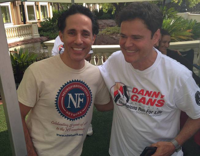 Donny Osmond, right, with Jeff Leibow, appears at the Danny Gans Memorial Champions Run for Life, a benefit for Nevada Childhood Cancer Foundation, on Saturday, Oct. 17, 2015, at Town Square.
