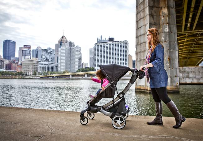 The 4moms Origami Stroller has a power-folding function that folds the stroller with the click of a button. It also is a cellphone-charging, mileage-counting, LCD-sporting stroller, with generators in the rear wheels that charge the stroller as you walk. 