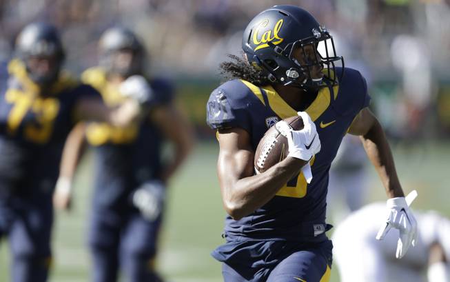 California's Maurice Harris runs to score a touchdown against Washington State during the second half of an NCAA college football game Saturday, Oct. 3, 2015, in Berkeley, Calif. California won the game 34-28.