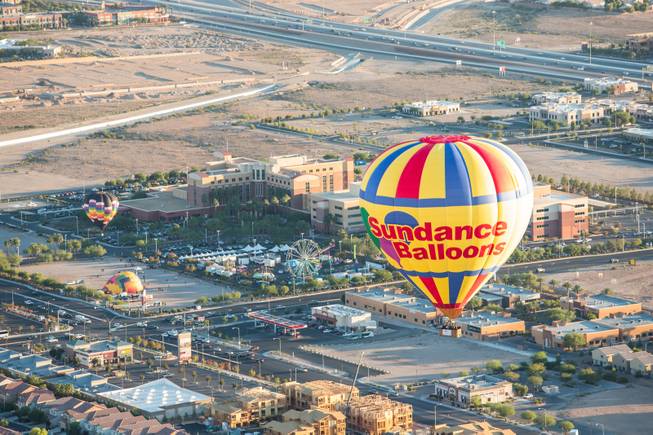 Hot air balloons take to the sky during the 5th annual Balloon Festival at Southern Hills Hospital, Friday Oct. 23, 2015.