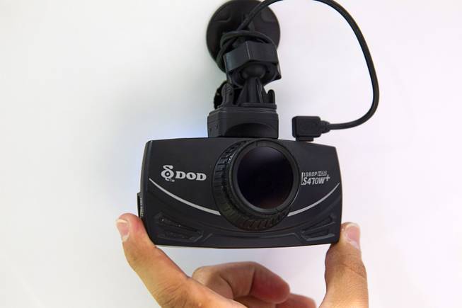 A DOD LS470W+ dash camera is displayed during the first day of the SEMA (Specialty Equipment Market Association) trade show at the Las Vegas Convention Center Tuesday, Nov. 3, 2015. The new dash cam has a larger screen than previous models and GPS data logging.  The device retails for $289.00 and is expected to be available in December 2015.