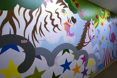 Portions of a mural by Sush Macheda are shown in a hallway at Child Haven Tuesday, Nov. 10, 2015.